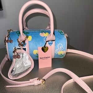 Juicy Couture Retro Cherry Mini Barrel Bag in Blue Gleam Multi.